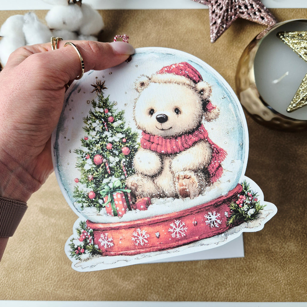 Weihnachtskarte mit Schneekugel-Motiv und Anhänger