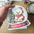 Weihnachtskarte mit Schneekugel-Motiv und Anhänger