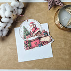 Weihnachtskarte mit Schneekugel-Motiv und Anhänger