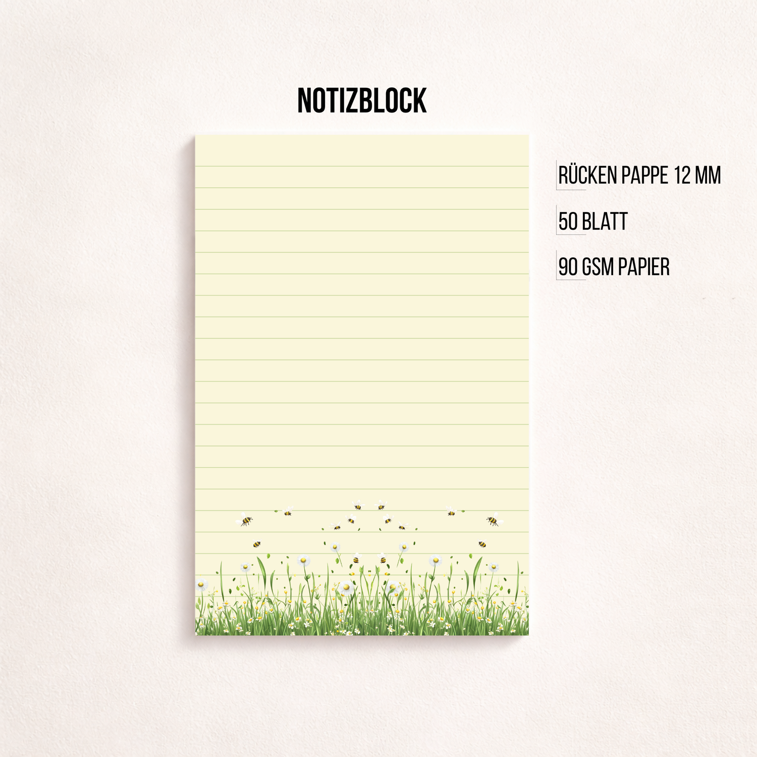 Schmaler, linierter Notizblock im Hochformat mit cremefarbenem Papier, feinen Linien und einer Blumenwiese mit kleinen Bienen am unteren Rand