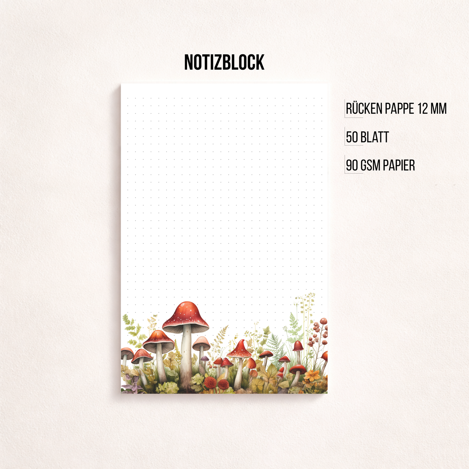 Weißes Notizblatt im Hochformat mit feinem Punktgitter und einer zarten Aquarell-Bordüre aus roten Pilzen, Blumen und Gräsern am unteren Rand