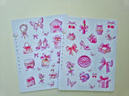 Zwei Stickerbögen im Format 13 × 17 cm mit romantischen pastellrosa Motiven (Schleifen, Parfumflakon, Geschenkboxen, Cupcake, Erdbeere, Kirschen, Blumen und Schmetterlinge) auf weißem Hintergrund
